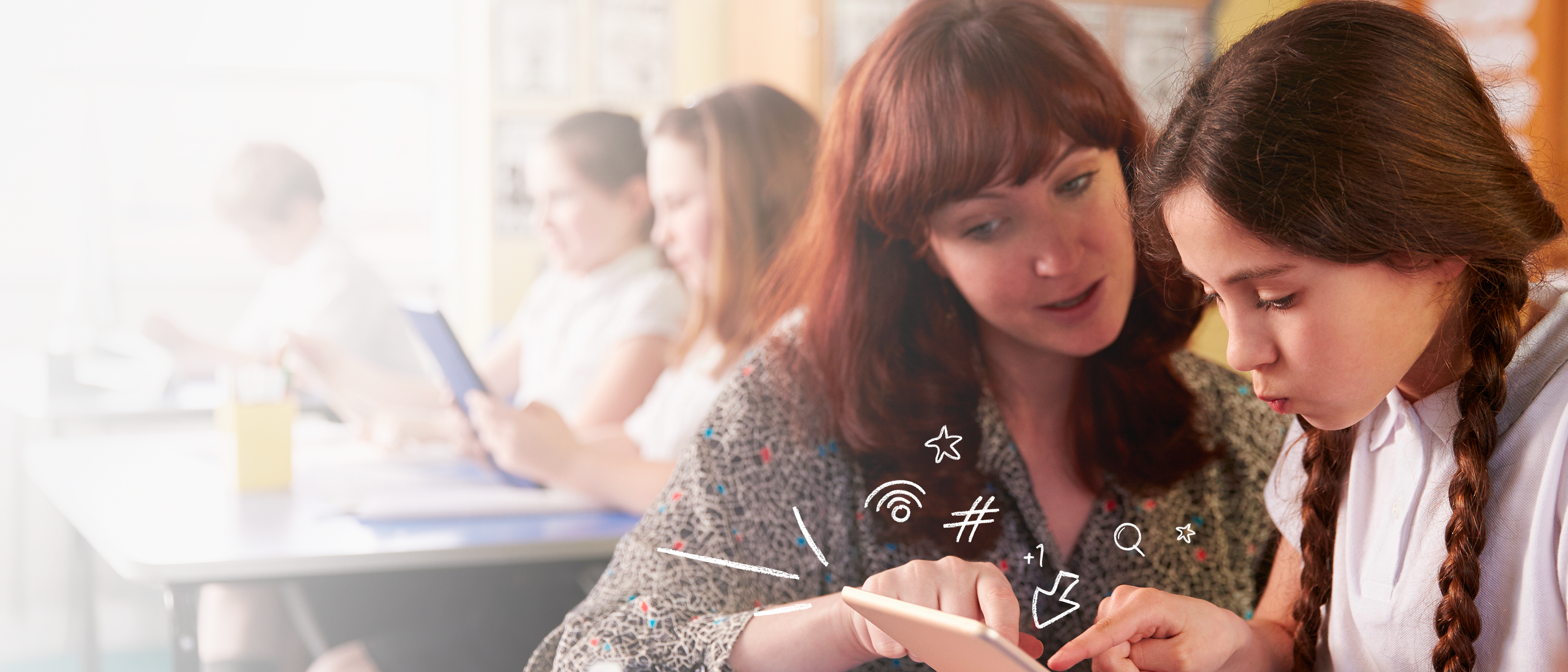 teacher working with student